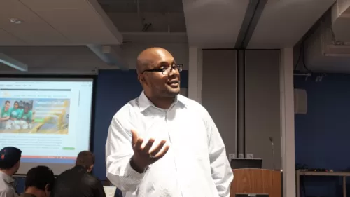 Marcus Harris, Build Social facilitator shares the COSTARTERS business model canvas with the crowd.